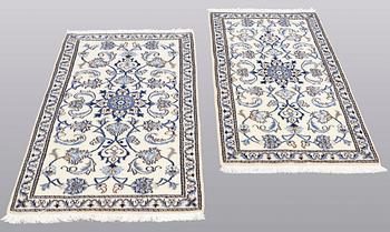 Two Nain rugs, part silk, ca 132 x 74 cm.