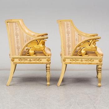 A pair of late Gustavian style armchairs, circa 1900.