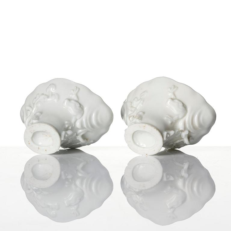 Two blanc de chine rhinoceros libation cups, Qing dynasty, Kangxi (1662-1722).