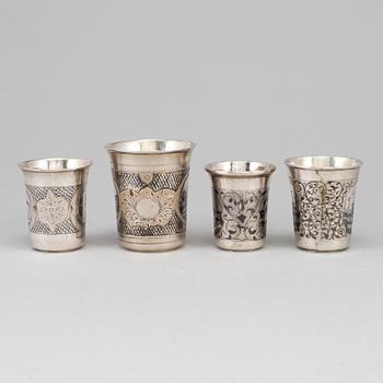 A set of four Russian 19th century silver and niello vodka cups, Moscow.