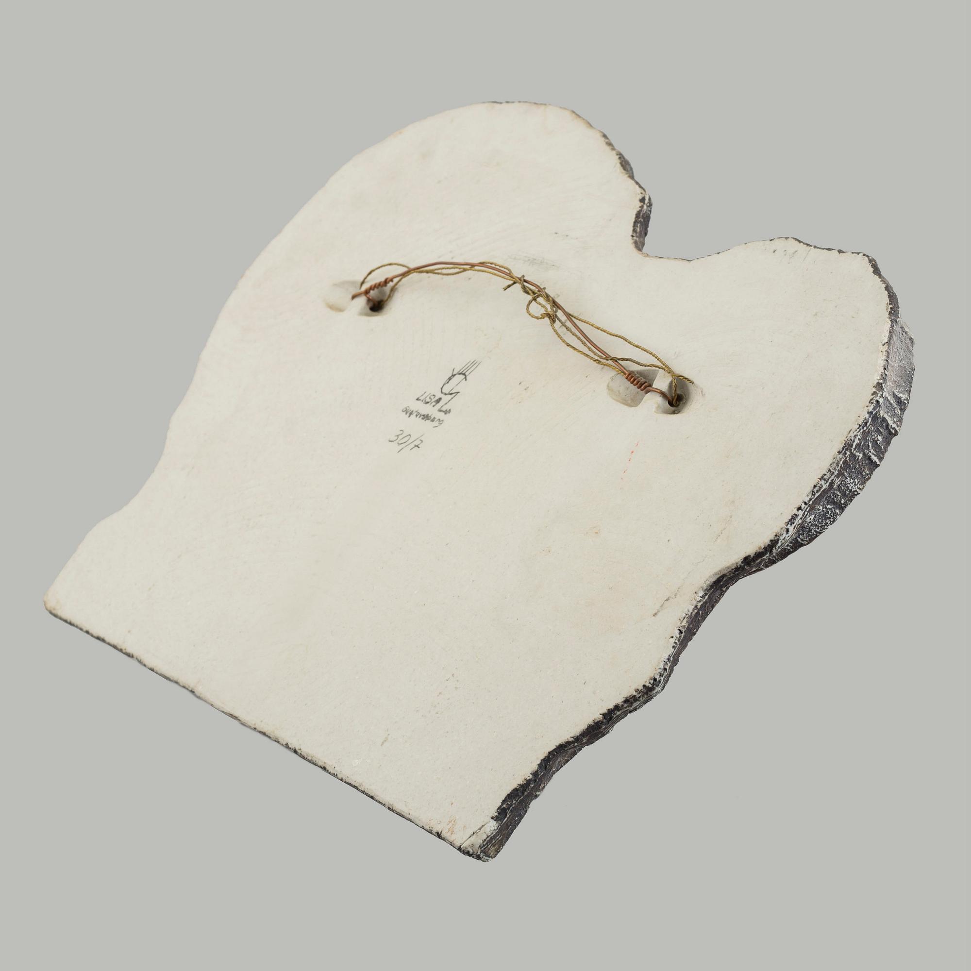 A Lisa Larson stoneware wall relief, signed and numbered 7/30.