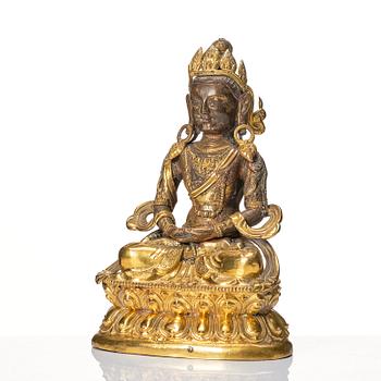 A Mongolian, partly gilt reoussé sculpture of Amitayus, 19th Century.