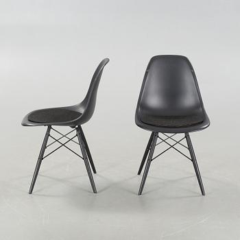 Six Charles & Ray Eames chairs by Vitra, 2013.