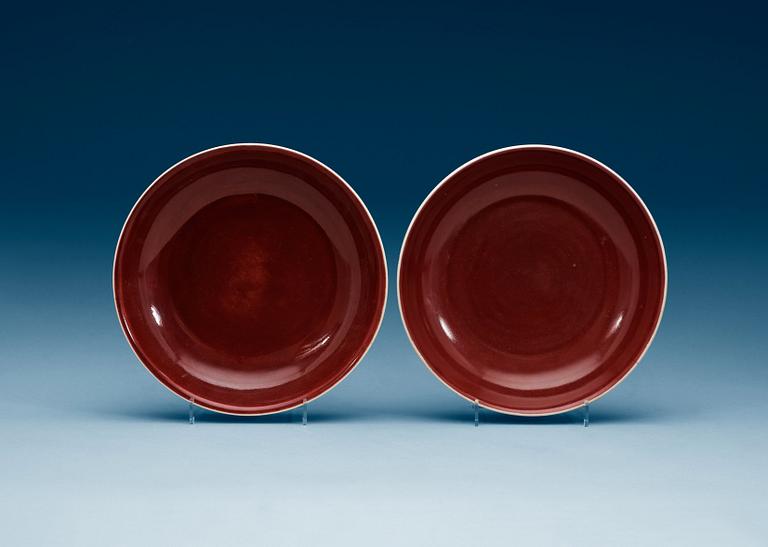 Two 'sang de beuf' glazed dishes, early 20th Century with Daouguangs märke.