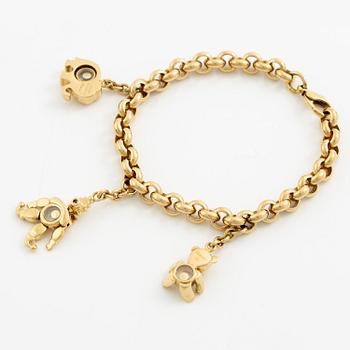 Chopard armband med berlocker 18K guld med runda briljantslipade diamanter.