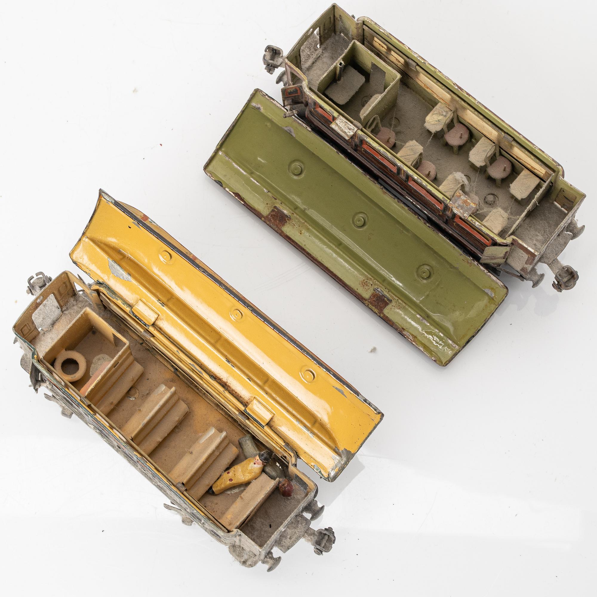 Model train with track and station building, 13 pieces, Germany, 1920s.