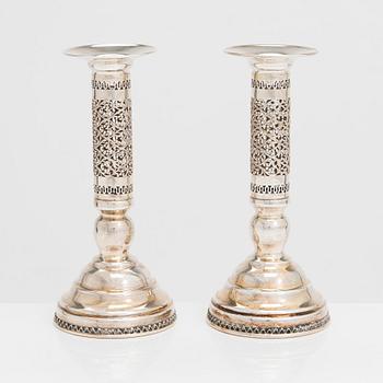 A pair of sterling silver candlesticks, latter half of the 20th century. Unidentified maker's mark.