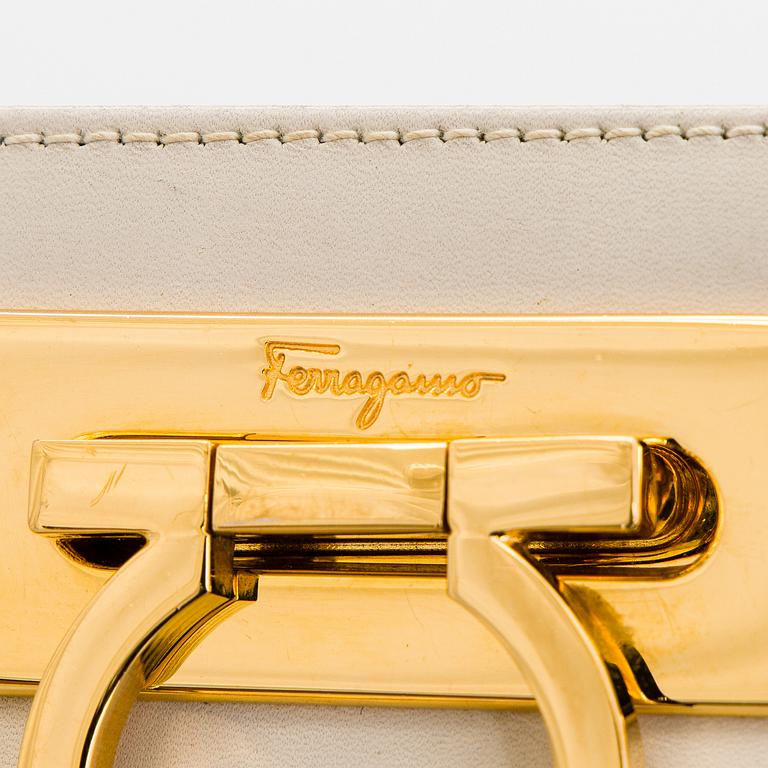 Salvatore Ferragamo, a leather “Gancini”bag.
