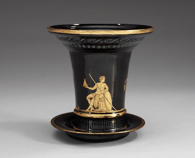 A Russian gilt black Etruscan style glass cache-pot with stand, circa 1800.