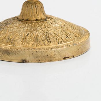 Ljusstake, brännförgylld brons, empire, 1800-talets första hälft.