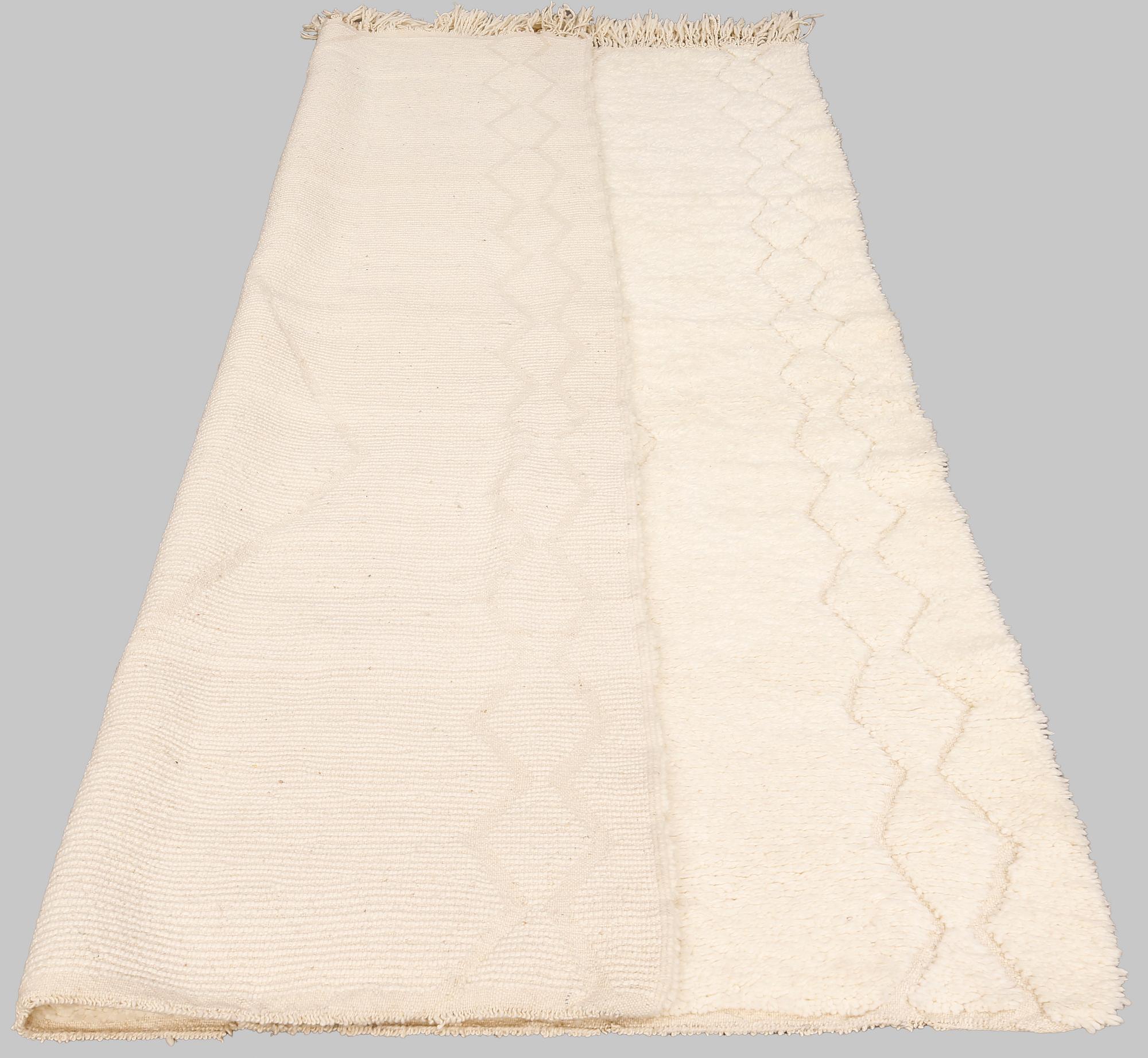A moroccan carpet, ca 250 x 168 cm.