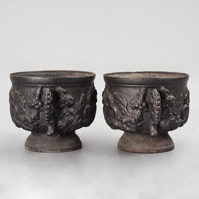 A pair of Swedish cast iron plant pot with the monogram of Queen Hedvig Eleonora, probably 1920's.