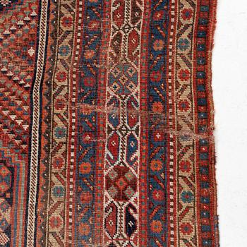 An antique Khamseh carpet, South western Iran, c 352 x 178 cm.