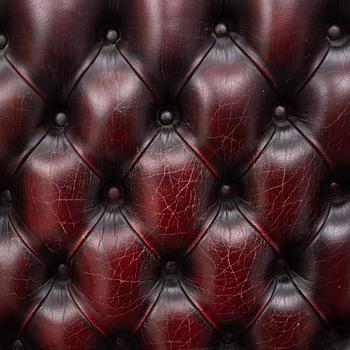 A pair of leather armchairs, end of the 20th century.