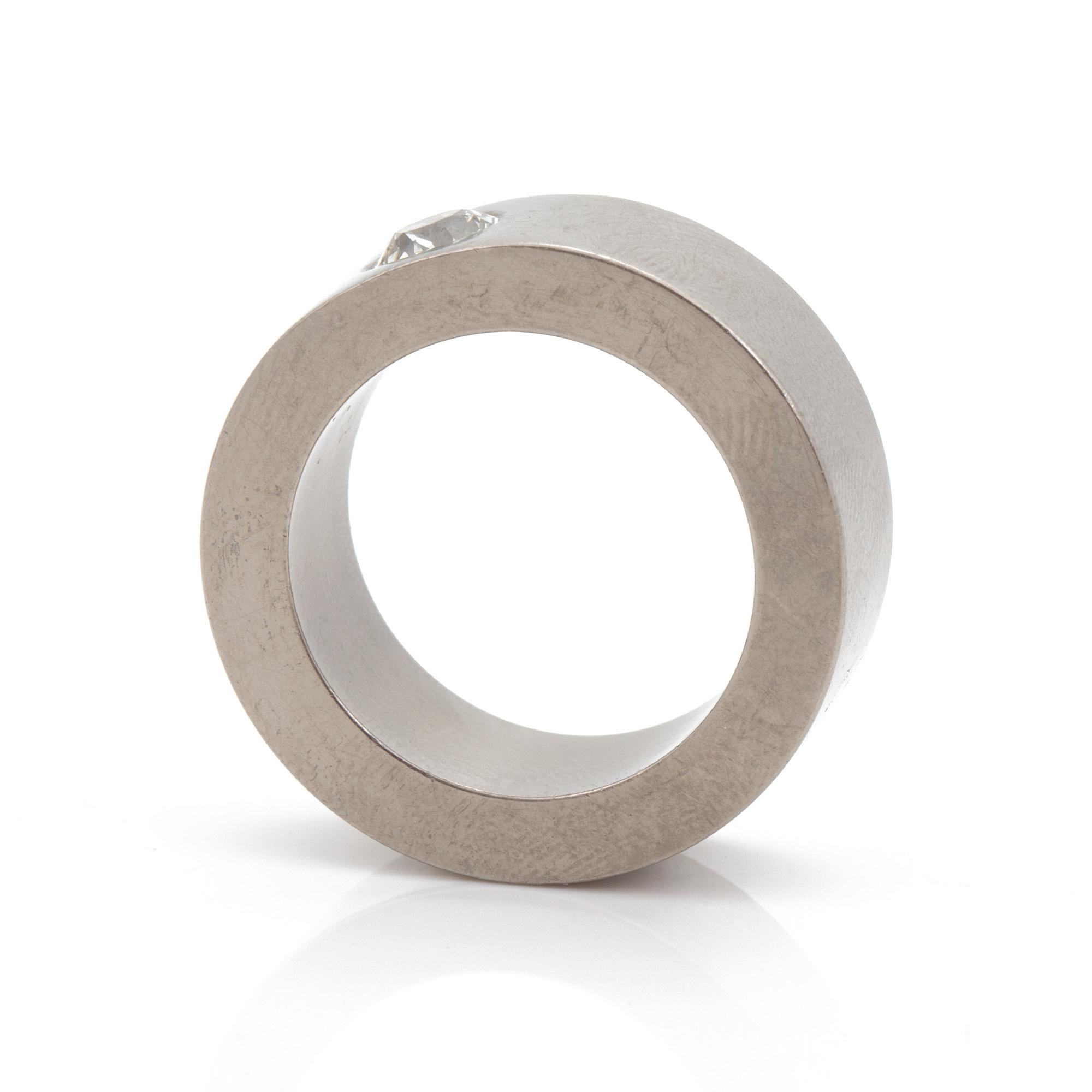 A ring set with an old-cut diamond.