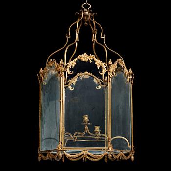 107A. A Swedish rococo gilt-brass four-light lantern, possibly a masterpiece, Stockholm, later part of the 18th century.