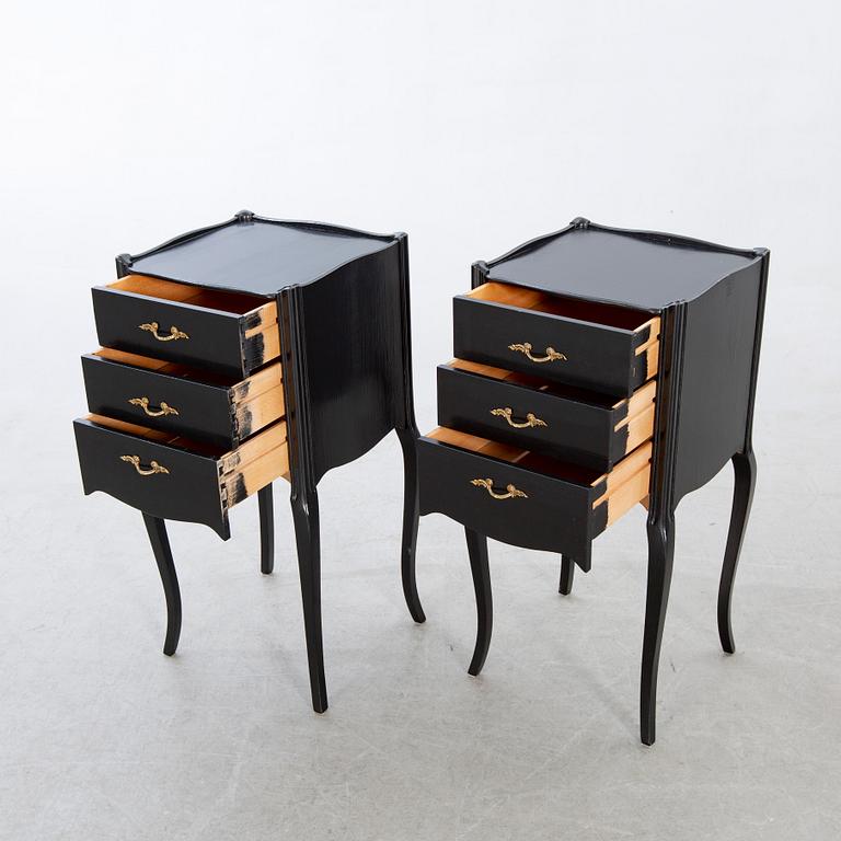 A pair of Rococo-style bedside tables later part of the 20th century.