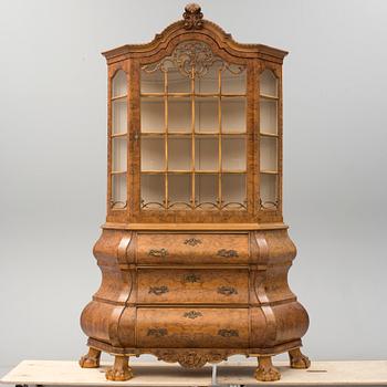 A Baroque style cabinet, First half of the 20th Century.