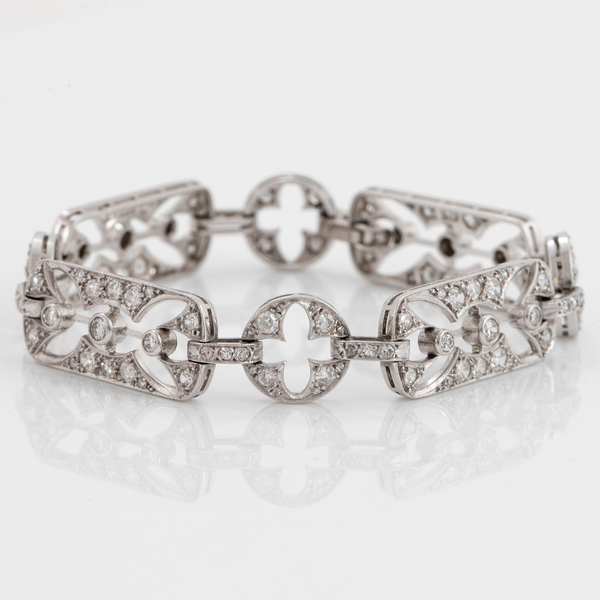 Armband platina med gammal- och åttkantslipade diamanter samt medföljande ring.