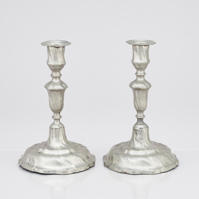 A pair of Rococo pewter candlesticks by C Sauer 1749.