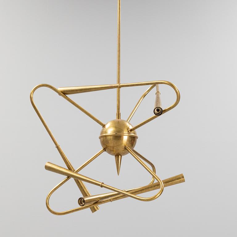 A mid 20th Century brass celiling light.