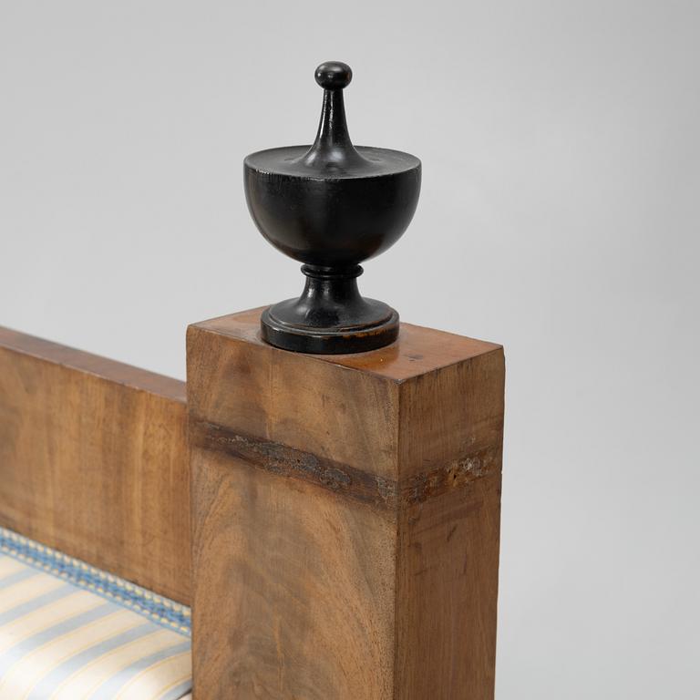 An Empire sofa, first half of the 19th century.