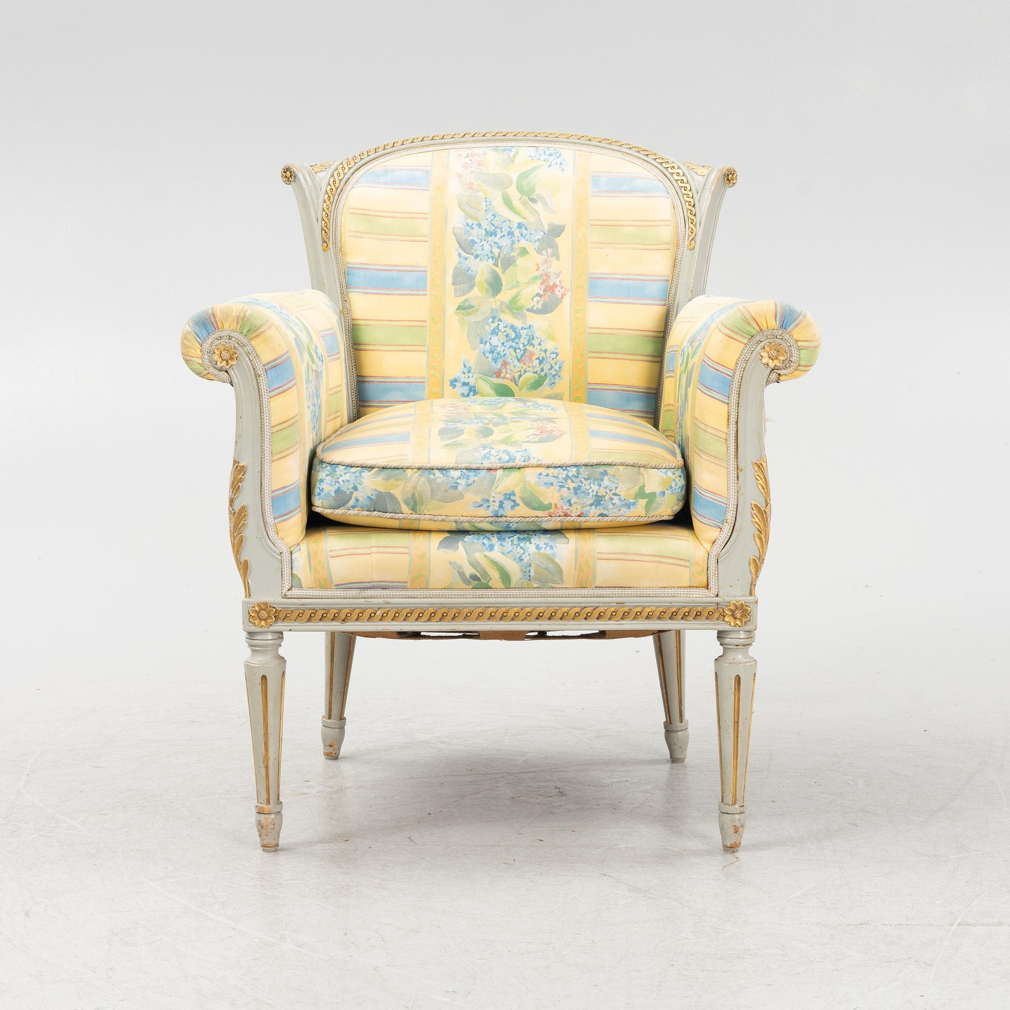 A Louis XVI style armchair, 20th Century.