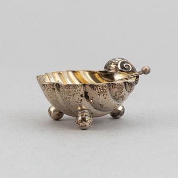 A set of six German parcel-gilt silver 800 salt cellars in fitted case.