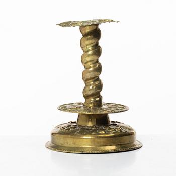 A Swedish baroque repousse brass candlestick, later part 17th century / circa 1700.