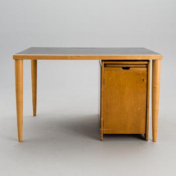 A writing desk and chest of drawers from the Domus Acadamica campus in Helsinki, designed in the 1940s.