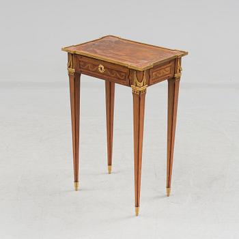 A Louis XVI-style circa 1900 occasional table.