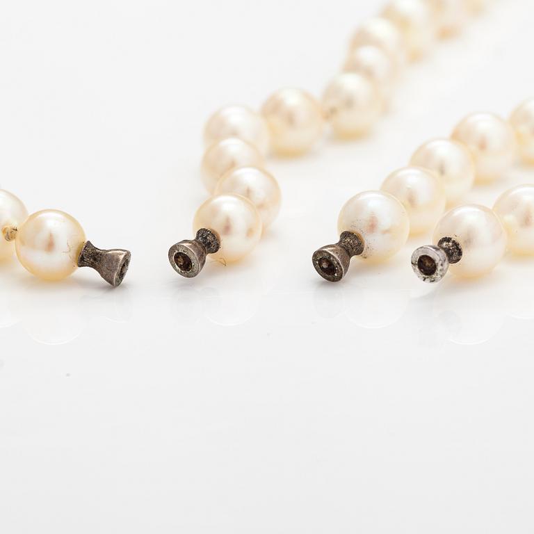 Two cultured pearl colliers without locks, silver parts. Probably Ole Lynggaard.