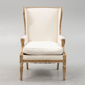 A Louis XVI-style armchair, later part of the 19th Century.