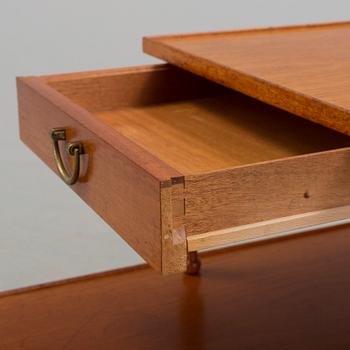 A mahogany sidetable model 1073 by Josef Frank for Firma Svenkt Tenn.