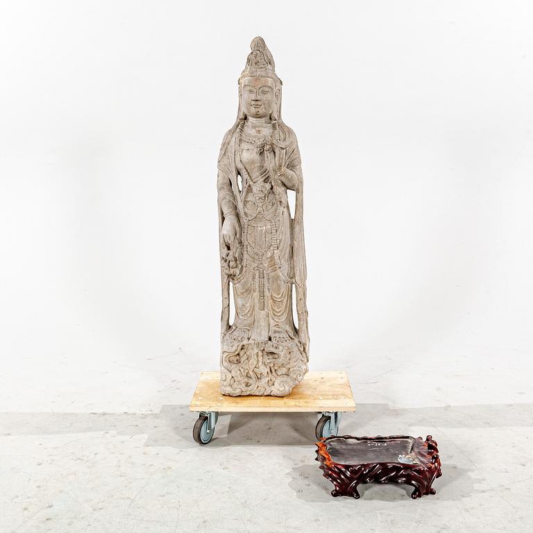 A stone sculpture of Boddhisattva, 20th Century.