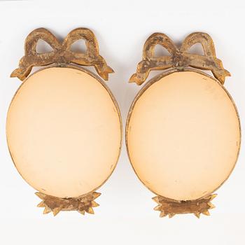 A pair of Gustavian style wall sconces, first half of the 20th Century.