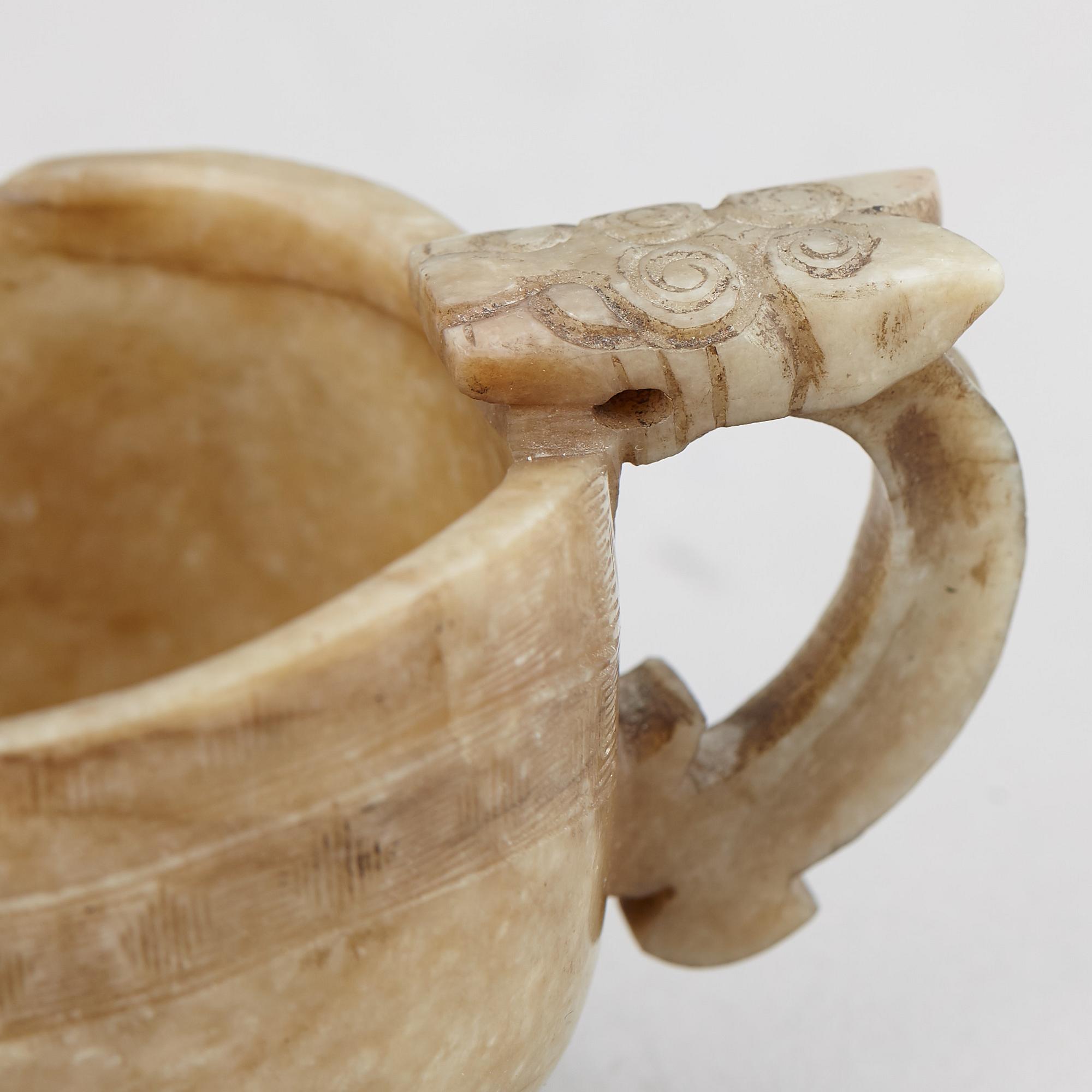 A group of three nephrite objects, Qing dynasty.