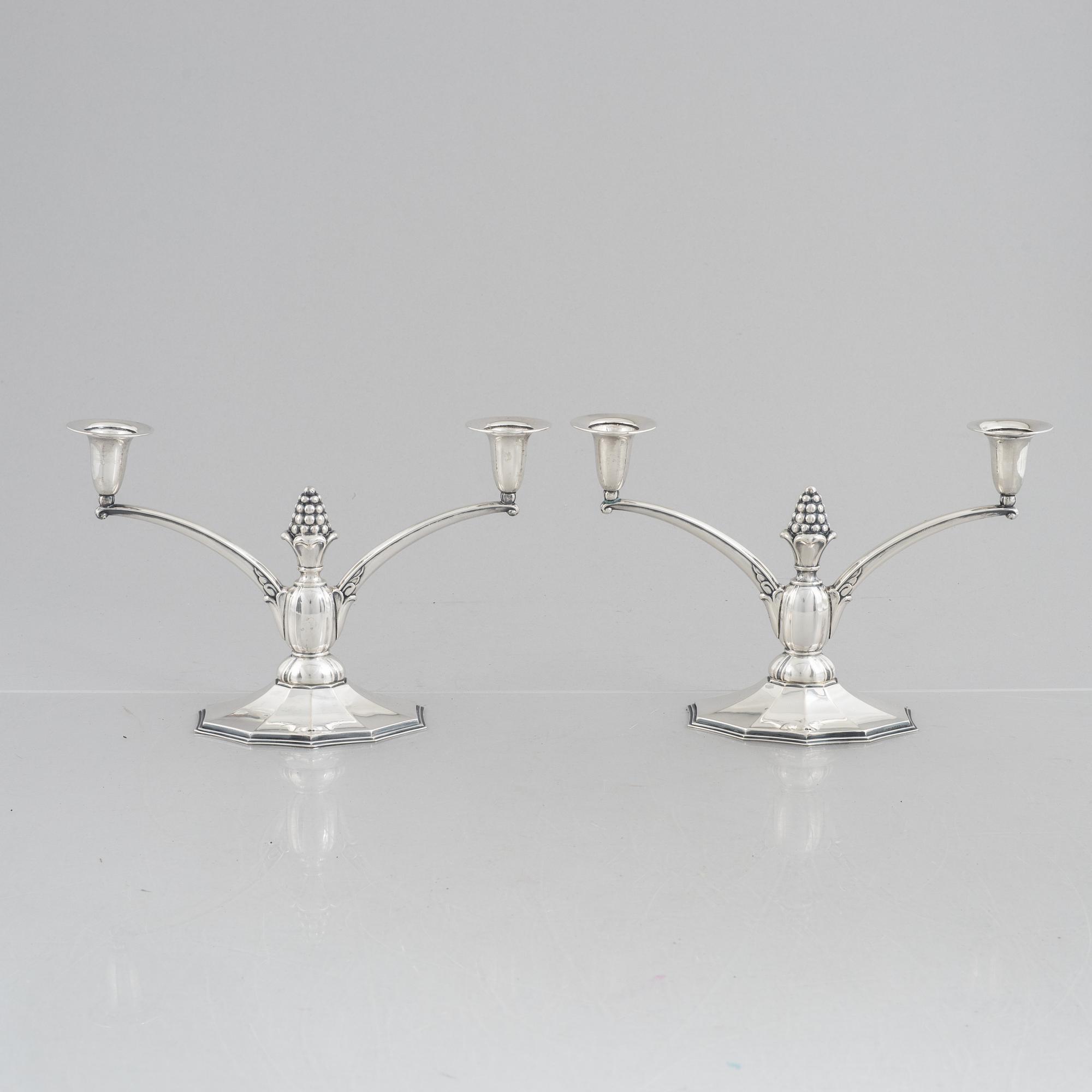 A pair of silver candelabra, Swedish import marks, probably 1920's/30's.