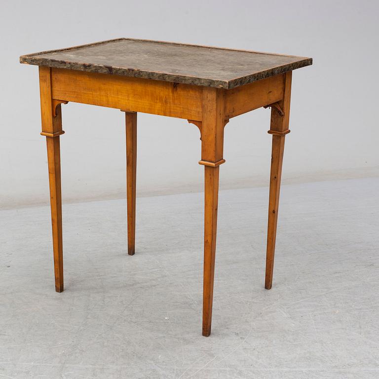 A Swedish late gustavian table. First half of the 19th century.