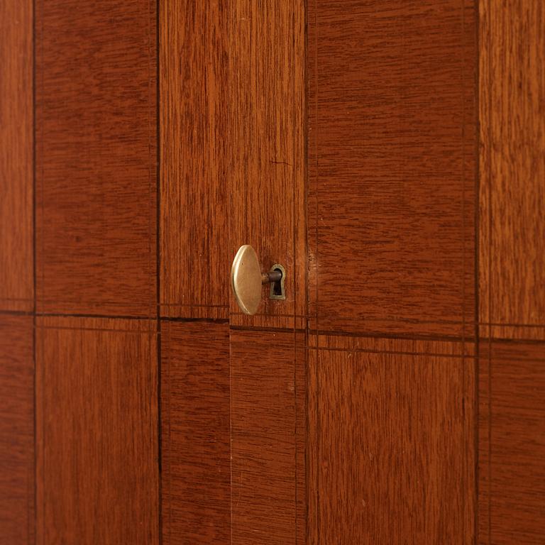 David Rosén, a mahogany and teak cabinet, for Stockholm's Association of Crafts, signed and dated 1959.