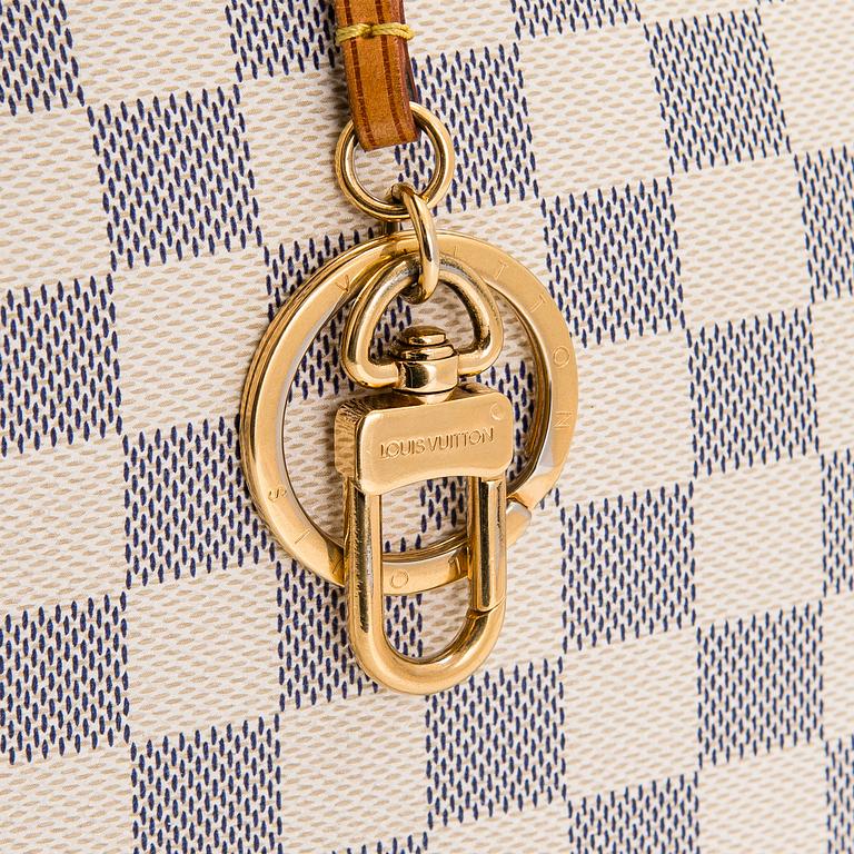 Louis Vuitton, an 'Artsy MM' handbag.