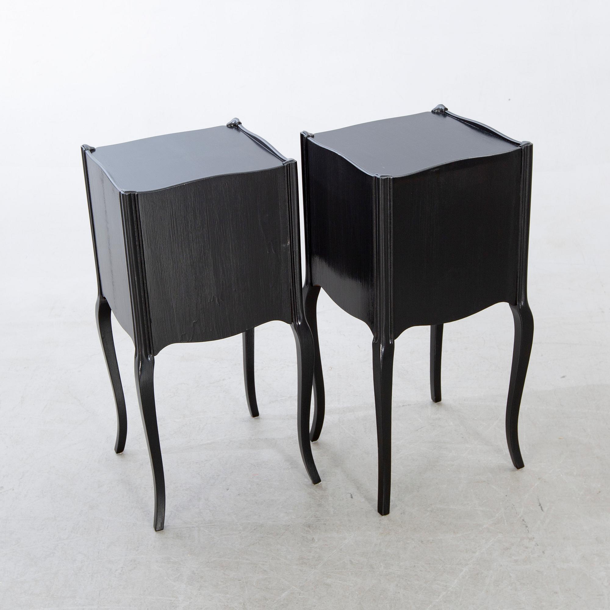 A pair of Rococo-style bedside tables later part of the 20th century.