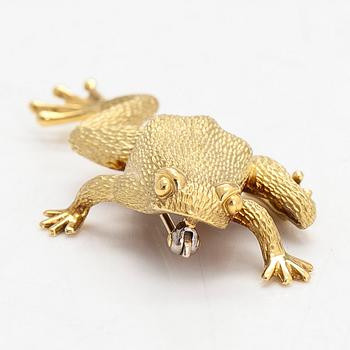 An 18K gold brooch, frog, signed Henry Dunay, New York.