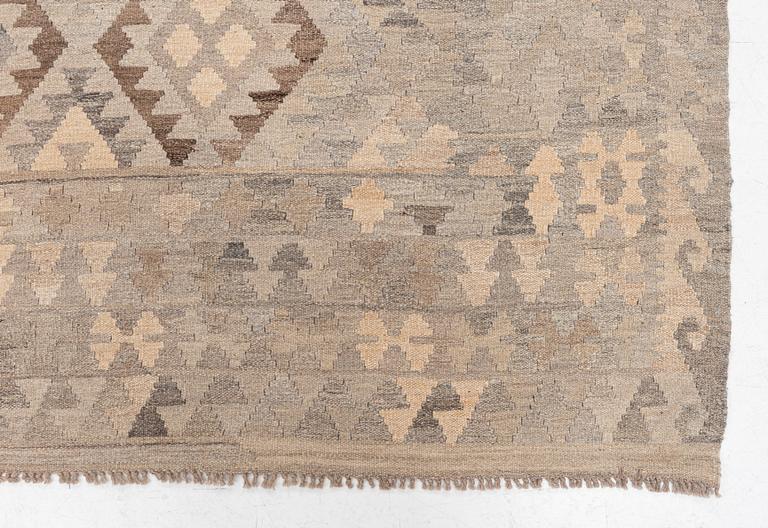 A Kelim carpet, c. 340 x 262 cm.