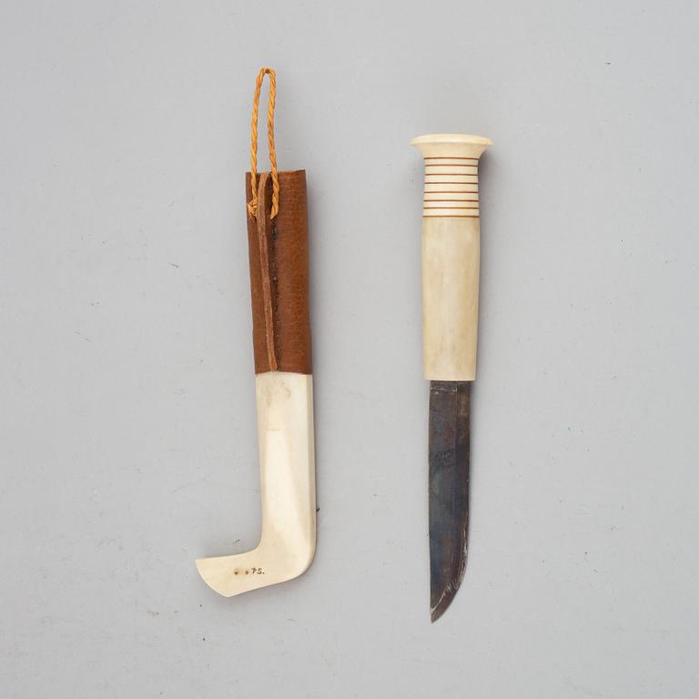 Per Sunna, a Sami rendeer horn knife, signed.