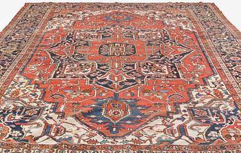 An antique Heris/Karadja carpet, approximately 501 x 339-353 cm.
