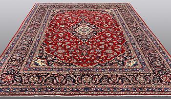 A carpet, Mashad, ca 346 x 248 cm.
