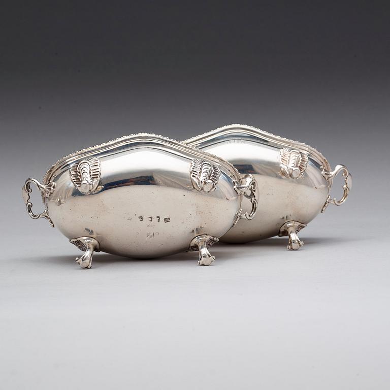 A pair of English 18th century silver sauce-tureens, marks of Sebastian & James Crespell, London 1772.