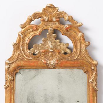 A pair of giltwood one-branch girandole mirrors by JP Larsson.