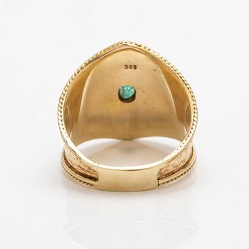 14K gold ring with an emerald.